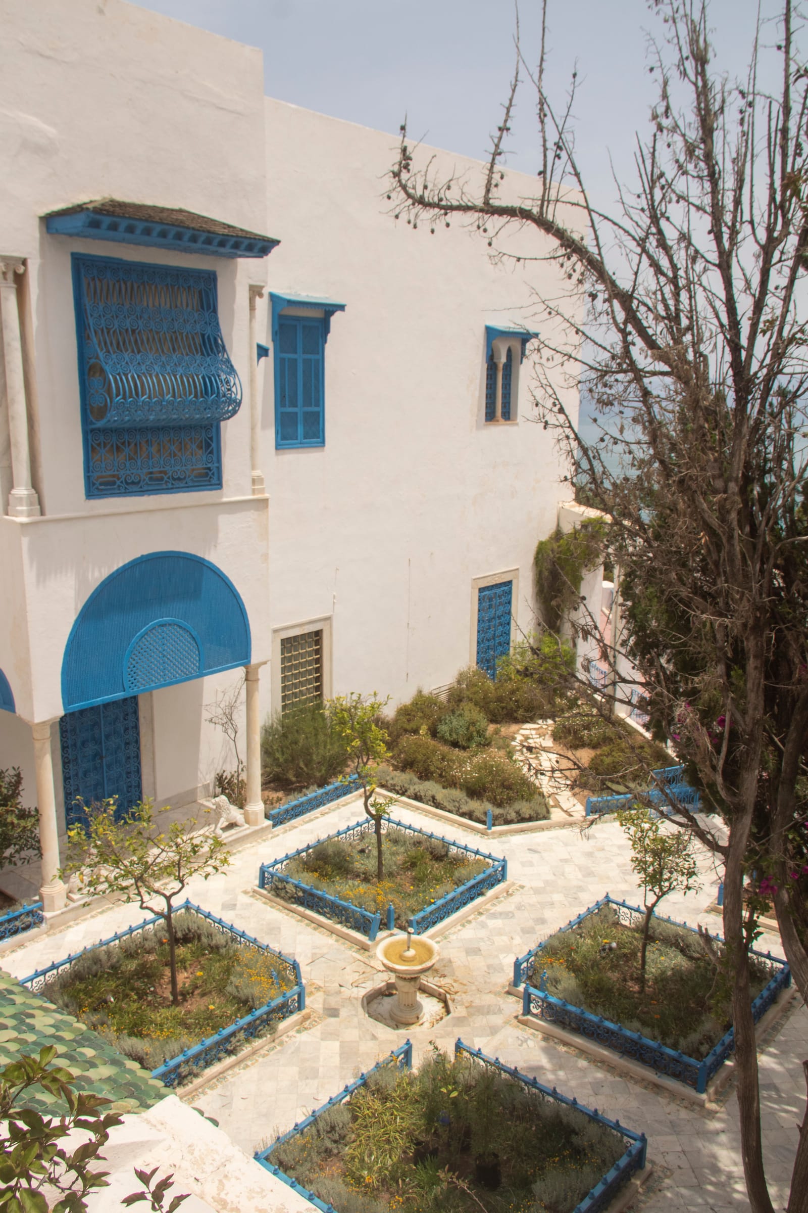 The Persian garden and blue water basins of the Ennejma Ezzahra palace