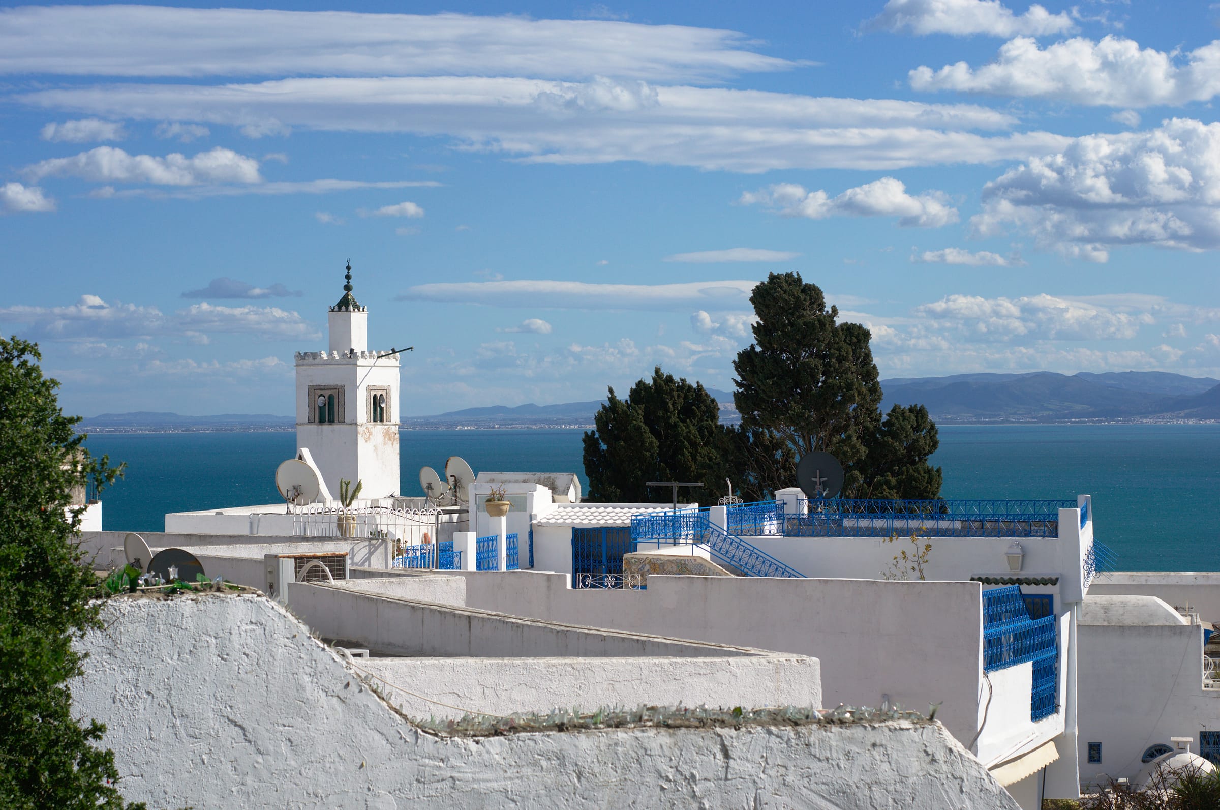 White houses with blue shutters above the Gulf of Tunis in Sidi Bou Said