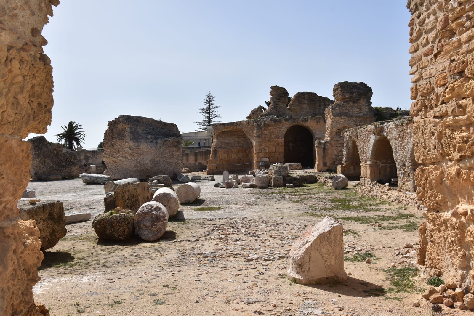 Roman columns and arches of the Antonine Baths at Carthage above the sea